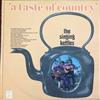 lytte på nettet The Singing Kettles - A Taste Of Country